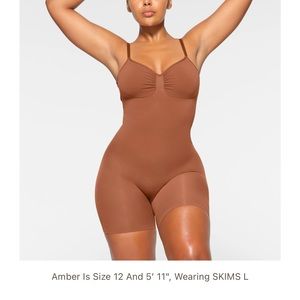 Skims bodysuit/ never worn .
